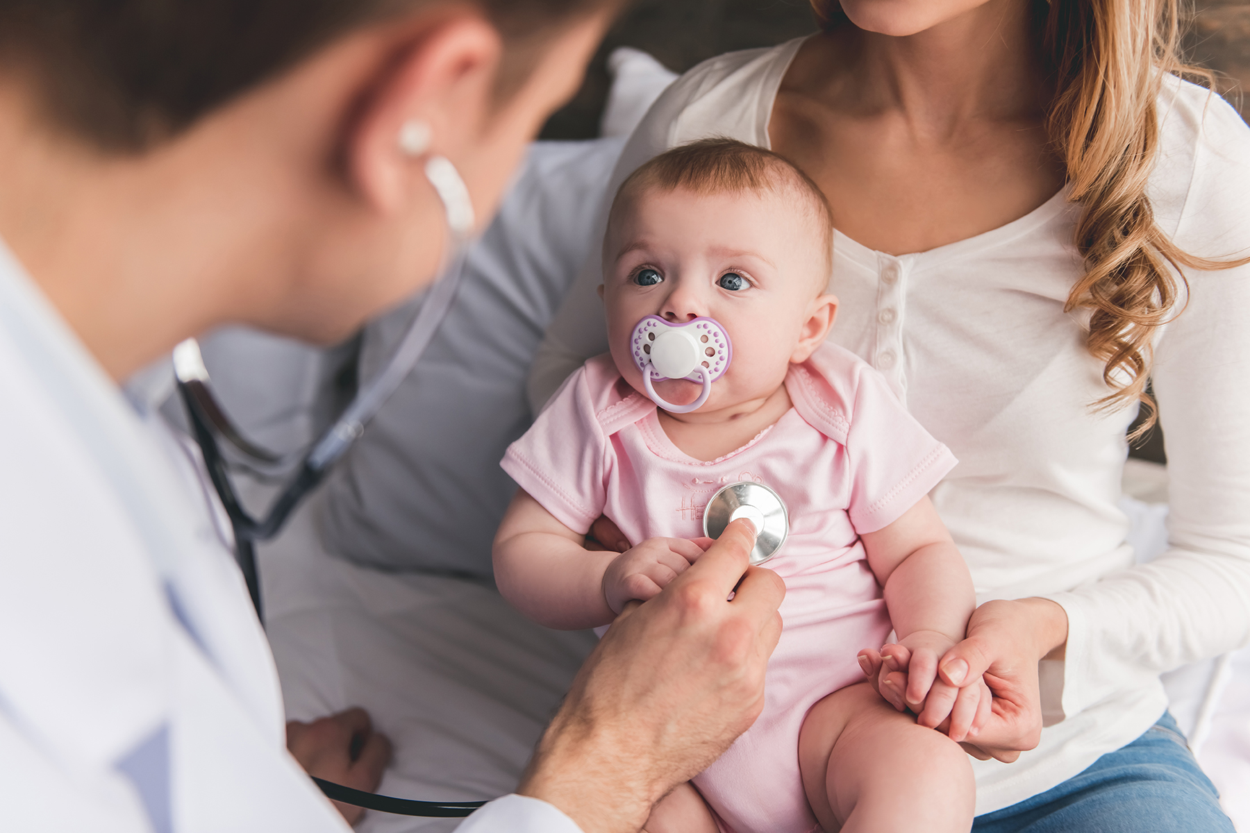 Baby at an appointment with a doctor