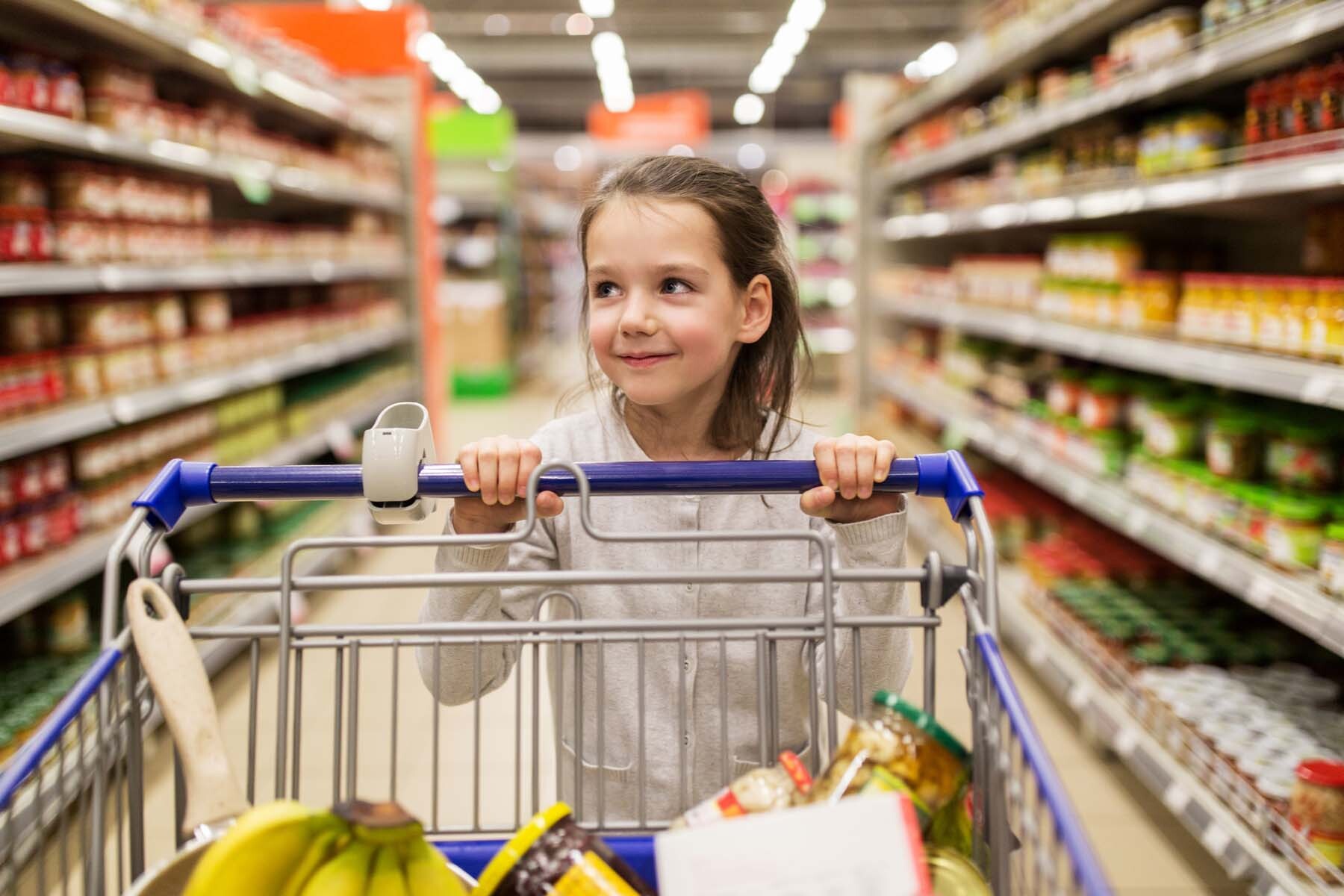 girl shopping in luxembourg supermarket